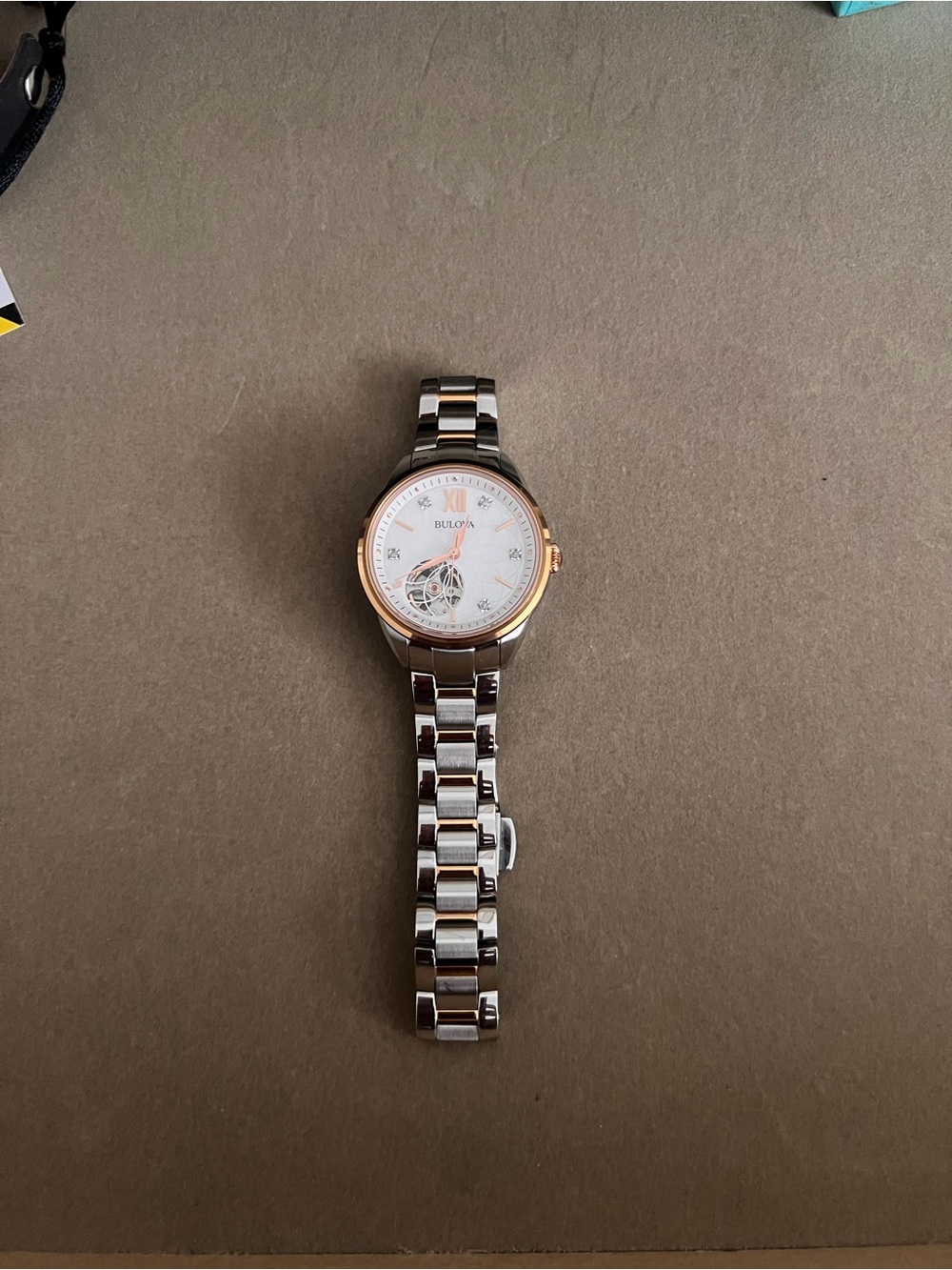 Bulova Two-Tone Silver and Rose Gold Open-Heart Bracelet Watch
